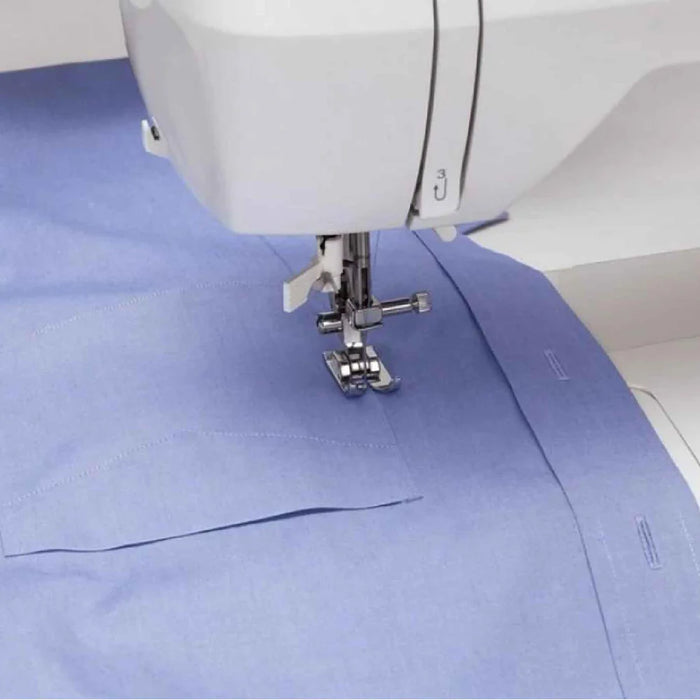 SINGER Brilliance 6180 sewing machine stitching fabric with presser foot and needle in action