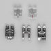 Set of five metal sewing machine presser feet on a gray background