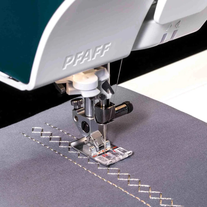 PFAFF sewing machine needle and presser foot on a piece of fabric