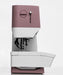 Sewing machine with a maroon top and base on a white background