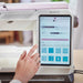 Husqvarna Viking EPIC QUILT 97 touch screen showing Joy OS Advisor settings for fabric type and stitch selection