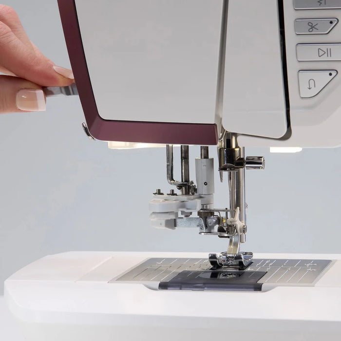 Husqvarna Viking Designer Topaz 65 sewing machine stitching thick fabric and leather with adjustable presser foot